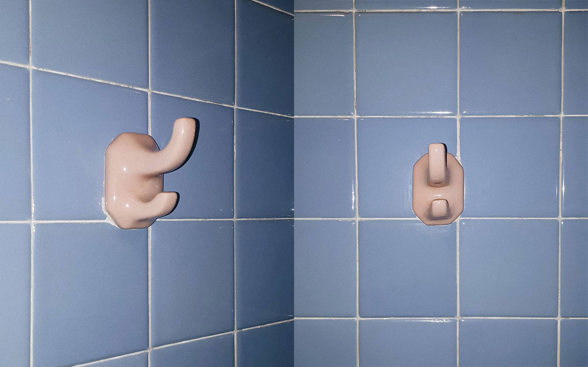 A double hook made of stoneware, pink enamel, fixed to a wall. Found on a private home in Mexico City, Mexico, 2018.