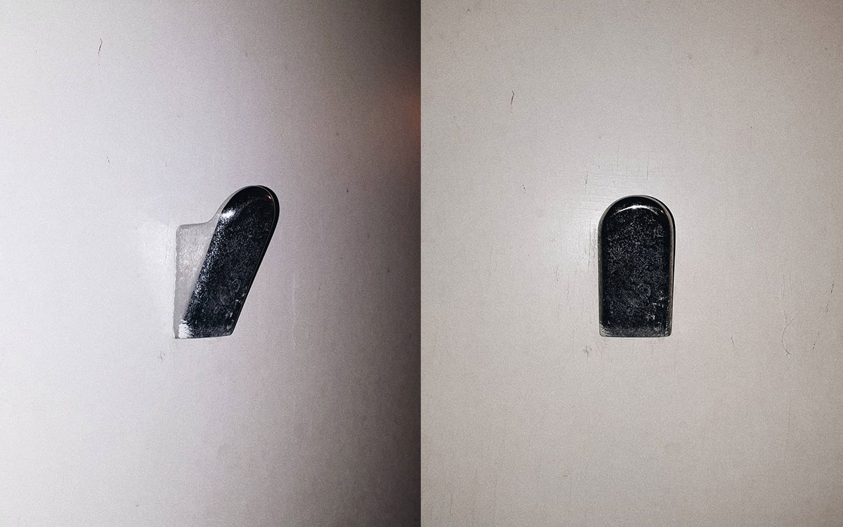 A single hook made of metal, chrome, screwed to a wall. Found in a private home at Sanary-sur-Mer, France, 2020.