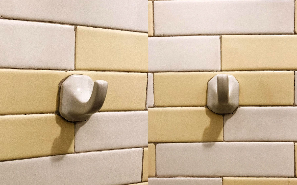 A single hook made of stoneware, white enamel, fixed to a wall. Found on a private home in Aguascalientes, Mexico, 2022.