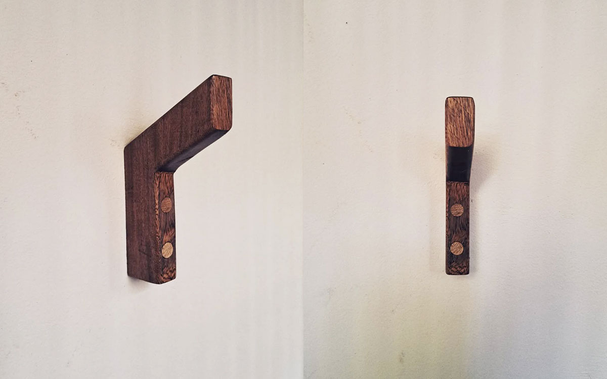 A single hook made of wood, screwed to a wall. Found on a private home in Puerto Escondido, Mexico, 2024.